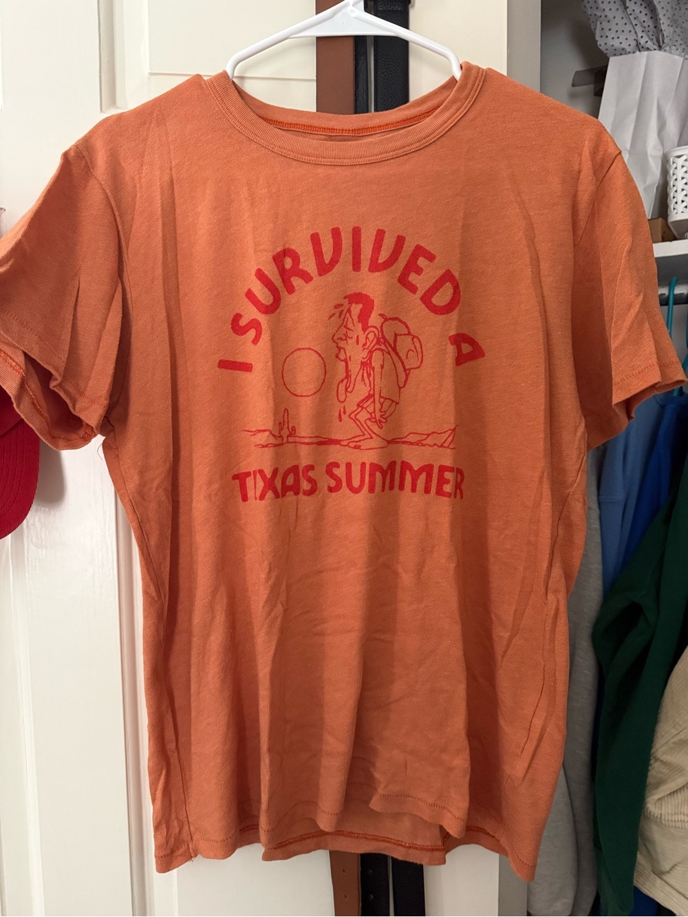 I Survived a Texas Summer Orange Norman Roscoe Tee